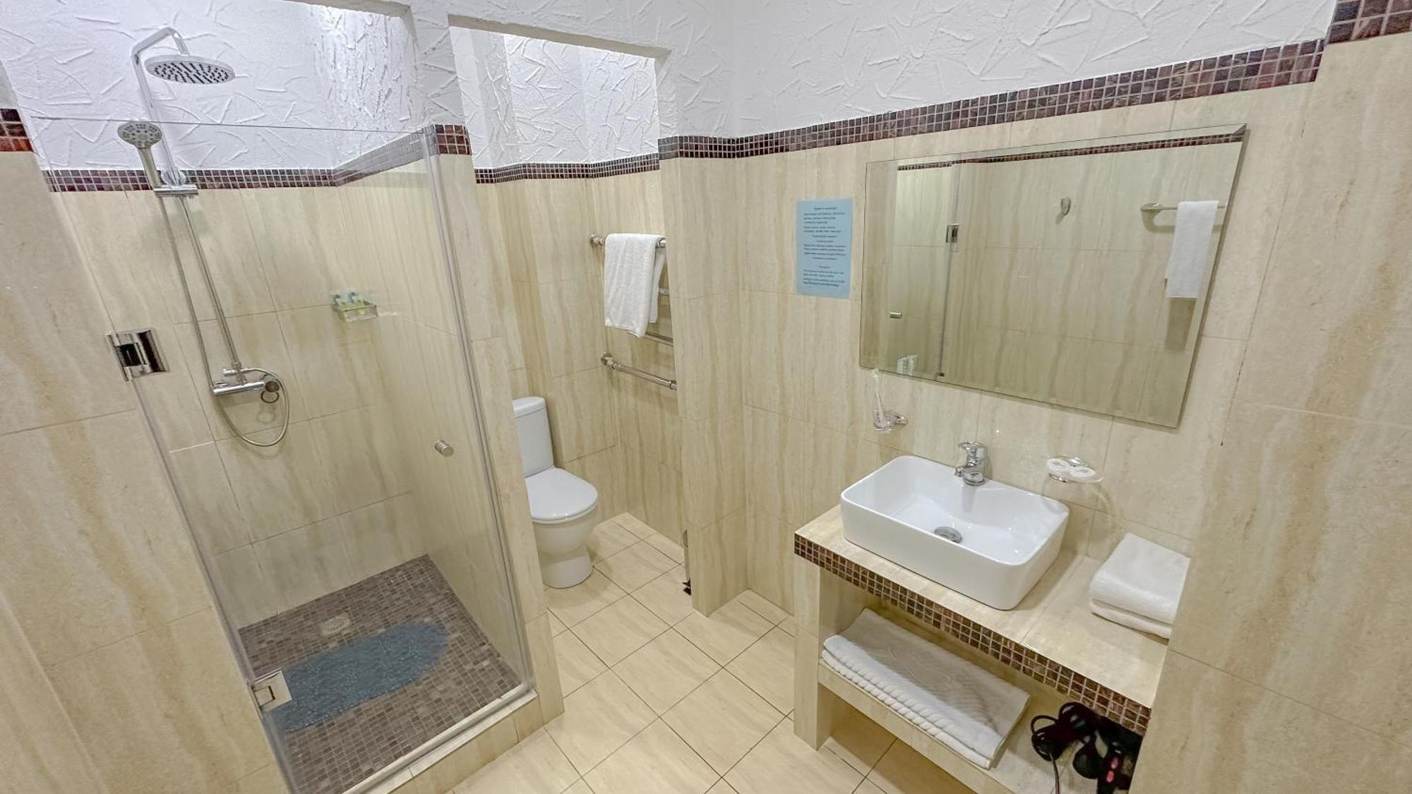 Resident Hotel Алматы Экстерьер фото