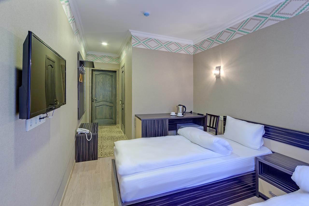 Resident Hotel Алматы Экстерьер фото